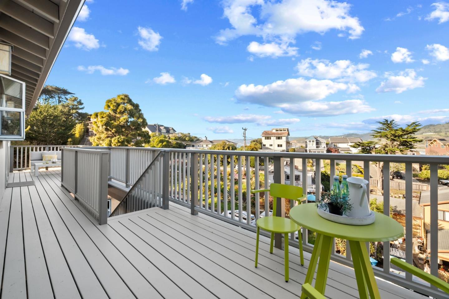 115 Stanley Avenue Pacifica, CA 94044 - Photo 11 of 61 a view of a balcony with chairs
