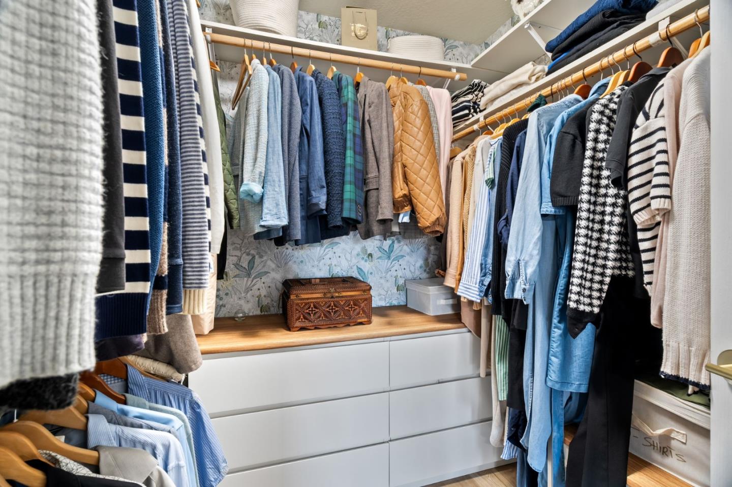 115 Stanley Avenue Pacifica, CA 94044 - Photo 22 of 61 a view of walk in closet with clothes and shoes