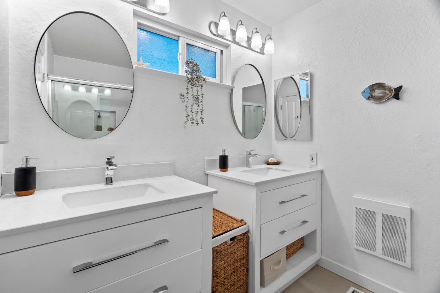 115 Stanley Avenue Pacifica, CA 94044 - Photo 23 of 61 a bathroom with a sink and a mirror
