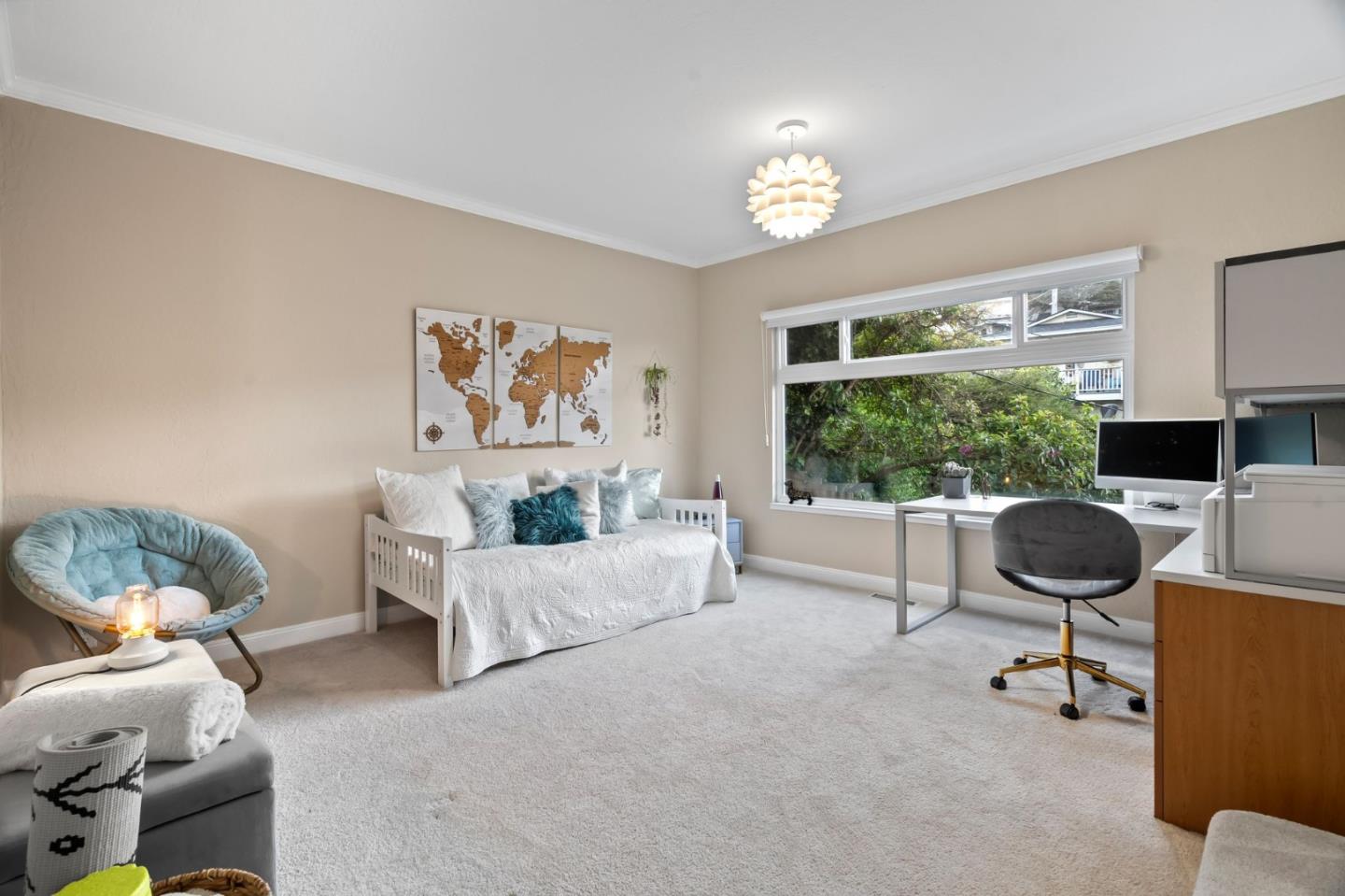 115 Stanley Avenue Pacifica, CA 94044 - Photo 29 of 61 a living room with furniture and a large window