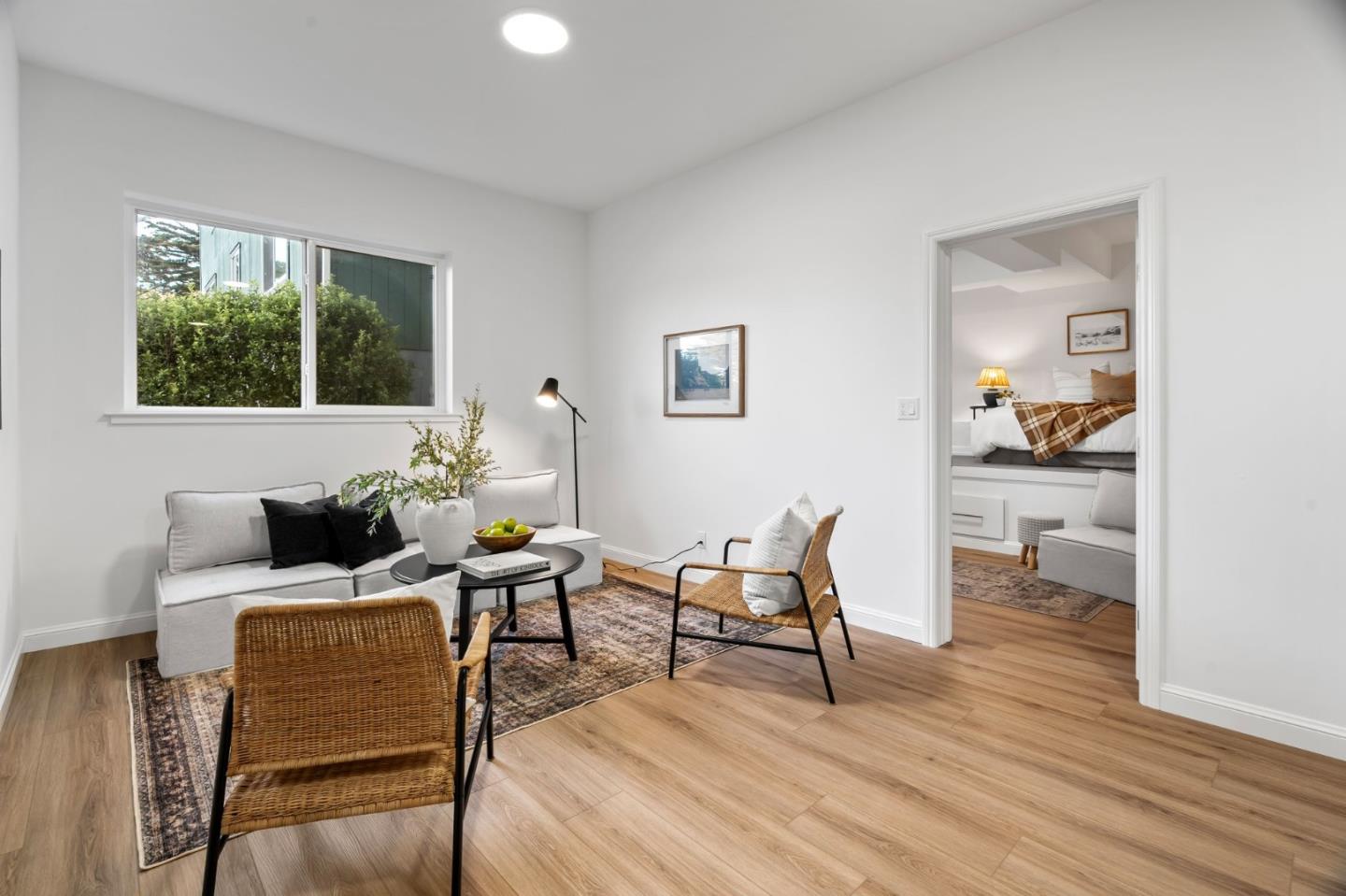 115 Stanley Avenue Pacifica, CA 94044 - Photo 34 of 61 a living room with furniture and a window