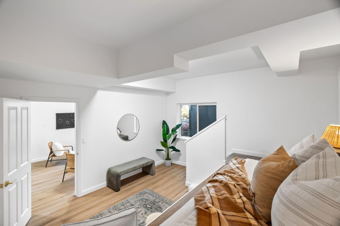 115 Stanley Avenue Pacifica, CA 94044 - Photo 36 of 61 a bedroom with a bed and a potted plant on the dresser