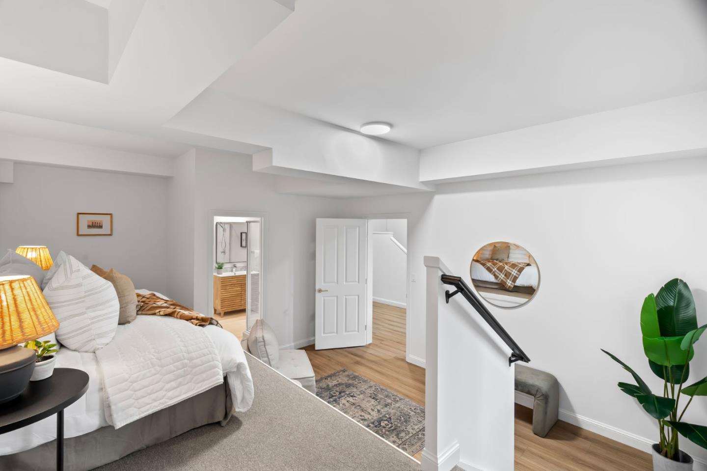 115 Stanley Avenue Pacifica, CA 94044 - Photo 38 of 61 a bedroom with a bed and a chandelier