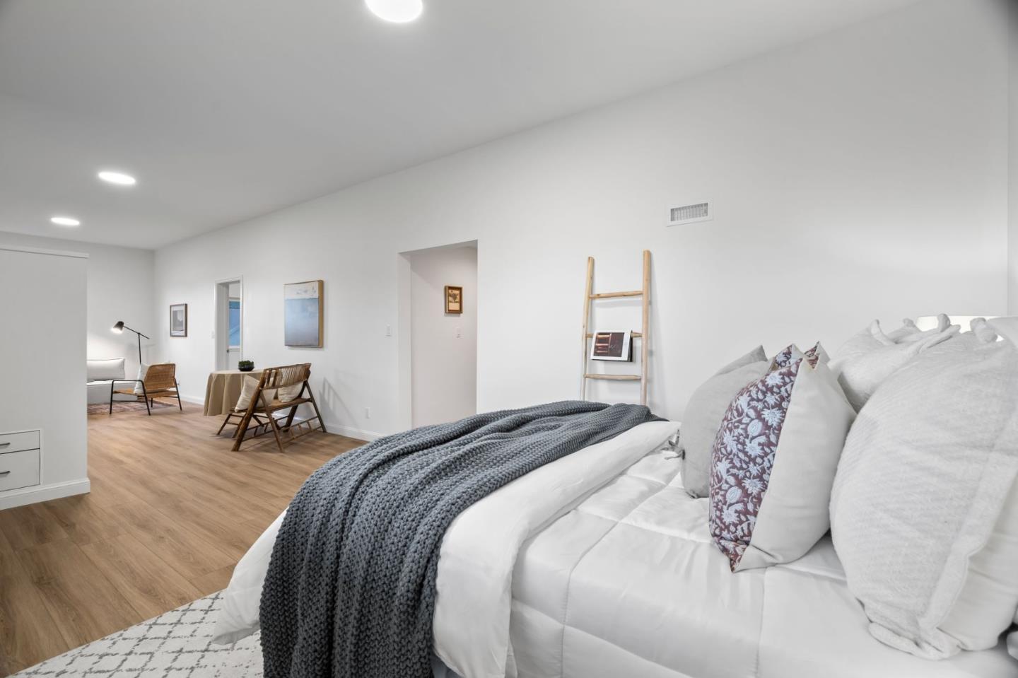 115 Stanley Avenue Pacifica, CA 94044 - Photo 40 of 61 a bed room with a bed and a chair