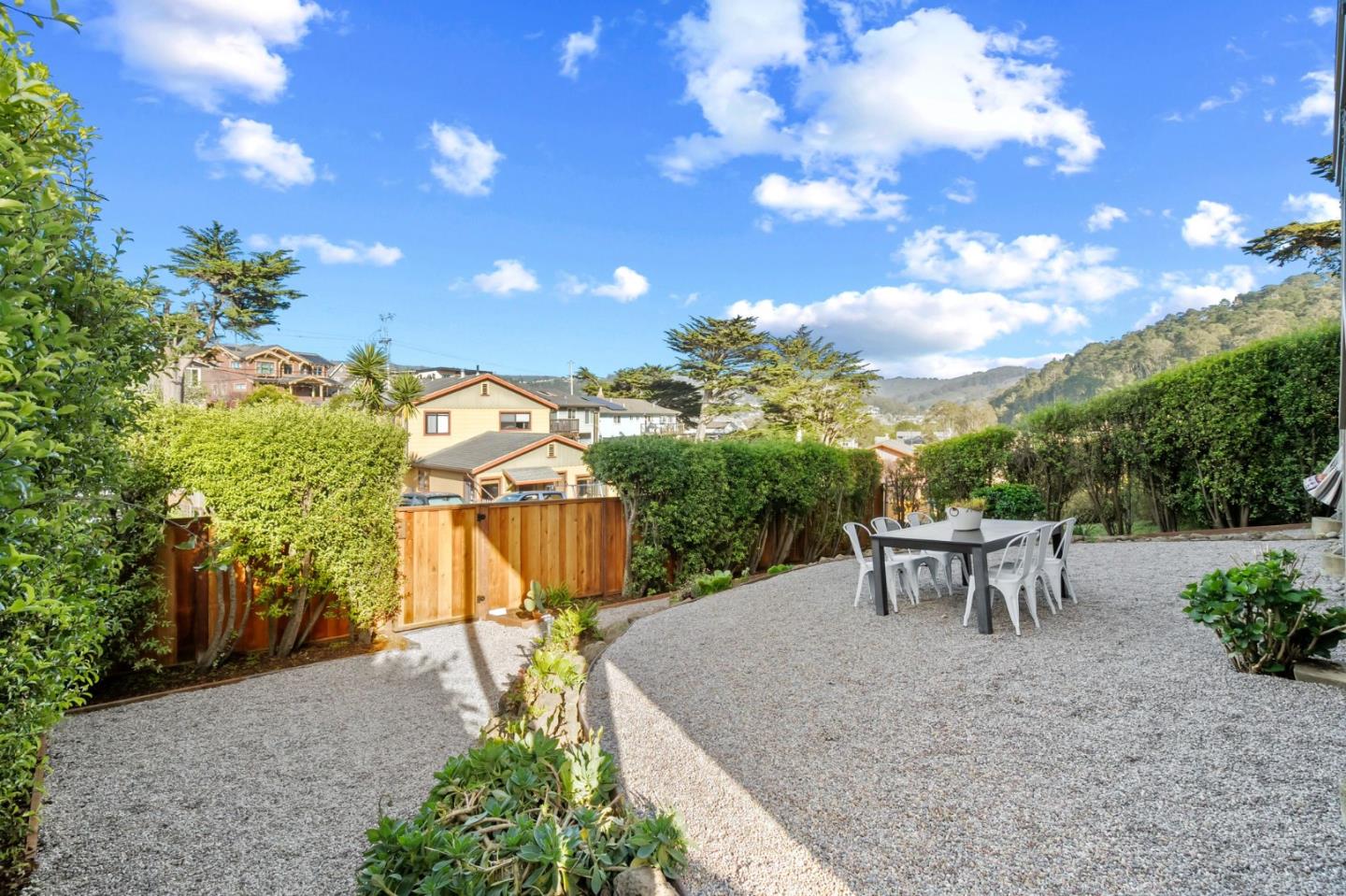 115 Stanley Avenue Pacifica, CA 94044 - Photo 43 of 61 a view of a table and chairs in patio