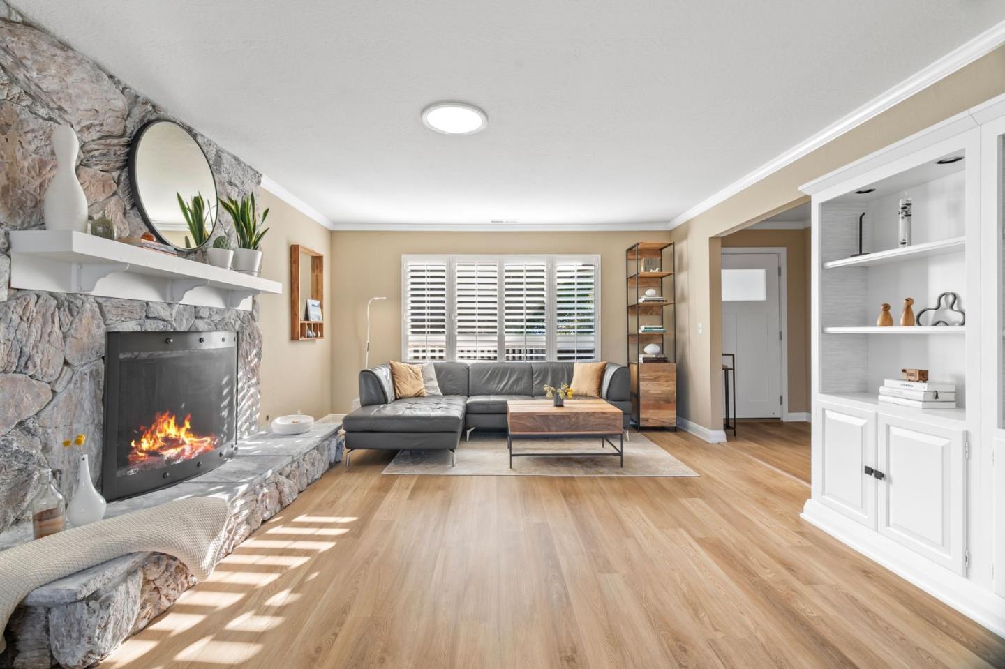 115 Stanley Avenue Pacifica, CA 94044 - Photo 7 of 61 a living room with furniture and a fireplace