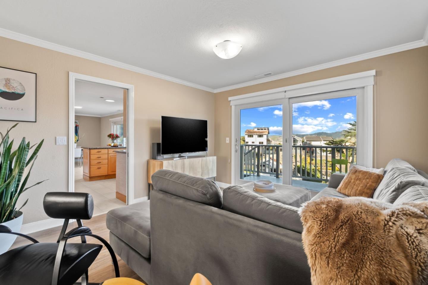 115 Stanley Avenue Pacifica, CA 94044 - Photo 9 of 61 a living room with furniture and a flat screen tv