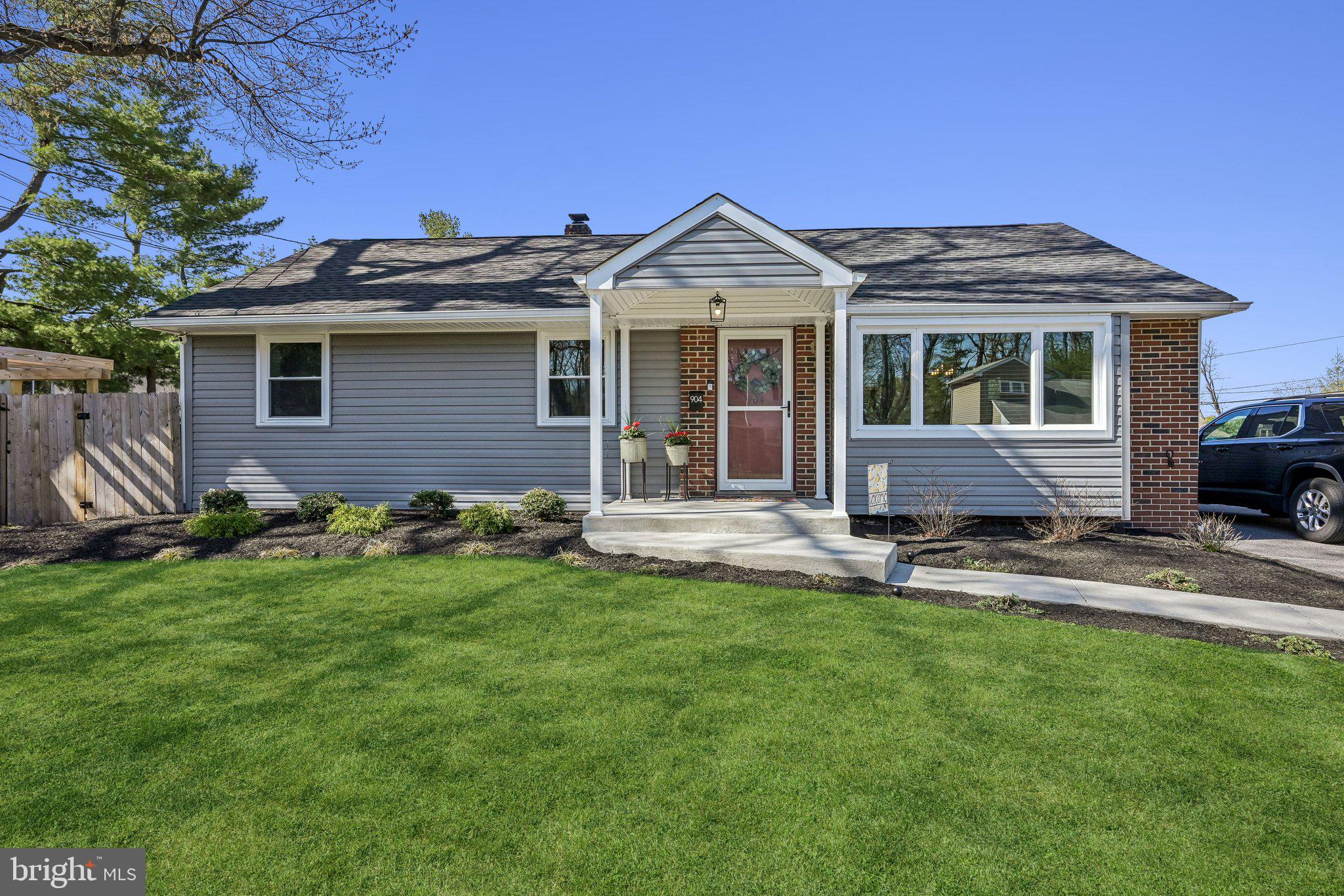 904 Geneva Avenue Delran, NJ 08075 - Photo 1 of 30 a front view of a house with a garden and yard