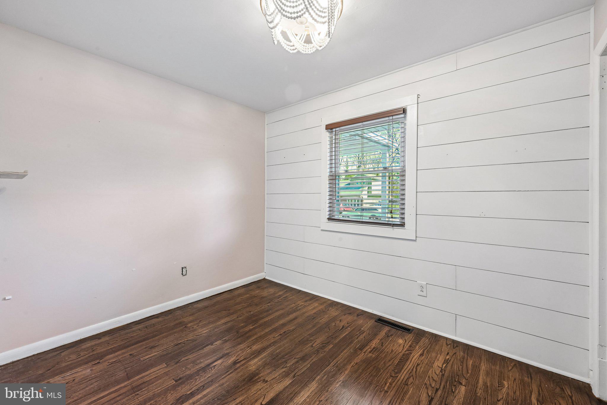904 Geneva Avenue Delran, NJ 08075 - Photo 18 of 30 wooden floor in an empty room with a window