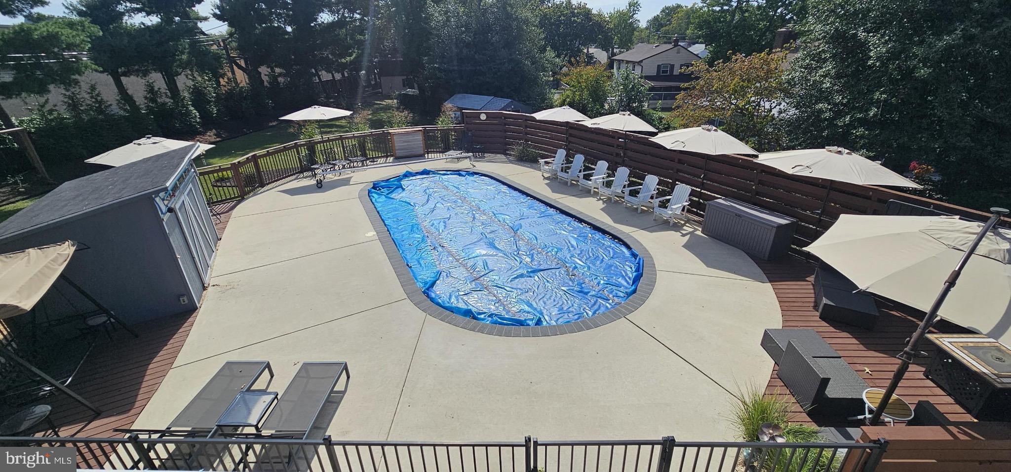 904 Geneva Avenue Delran, NJ 08075 - Photo 28 of 30 a view of a swimming pool with outdoor seating