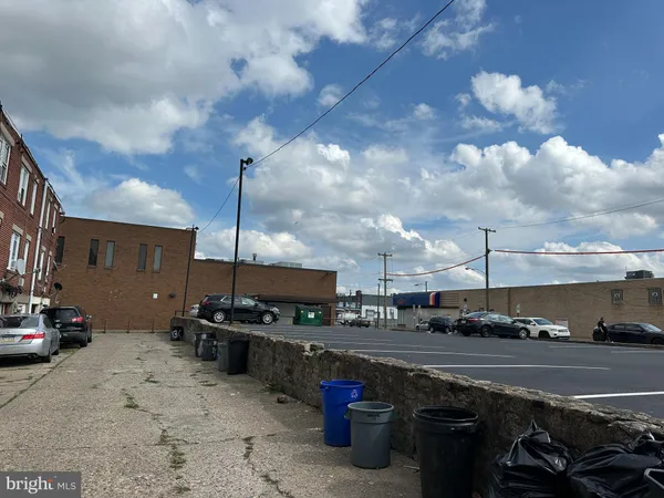 a view of a street with cars