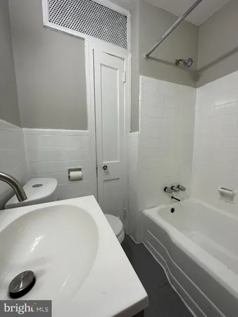 a bathroom with a sink and a bathtub