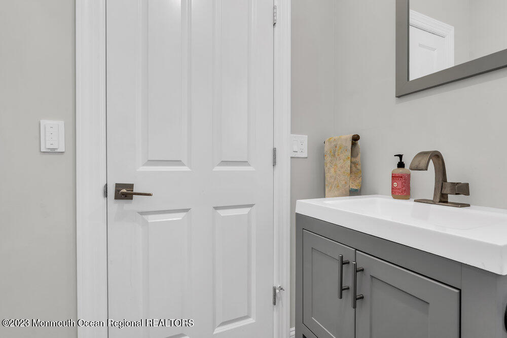 800 Wall Road Spring Lake Heights, NJ 07762 - Photo 12 of 41 a bathroom with a sink and vanity