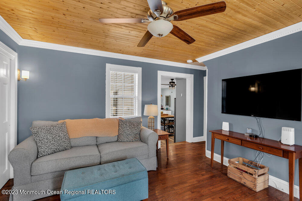 800 Wall Road Spring Lake Heights, NJ 07762 - Photo 13 of 41 a living room with furniture and a flat screen tv