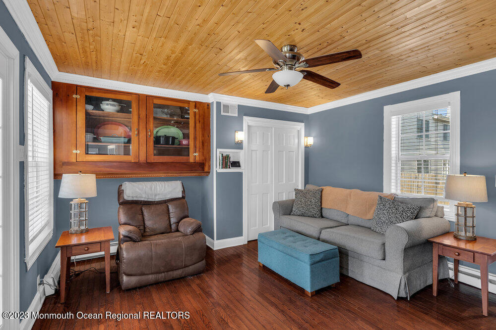 800 Wall Road Spring Lake Heights, NJ 07762 - Photo 14 of 41 a living room with furniture and a large window