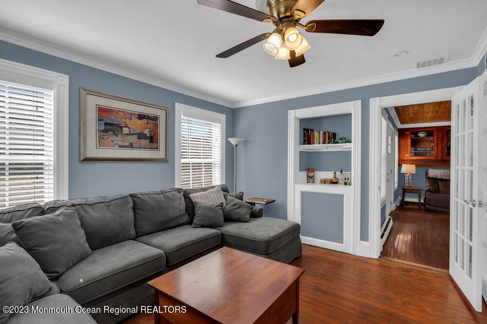 800 Wall Road Spring Lake Heights, NJ 07762 - Photo 16 of 41 a living room with furniture a ceiling fan and a window