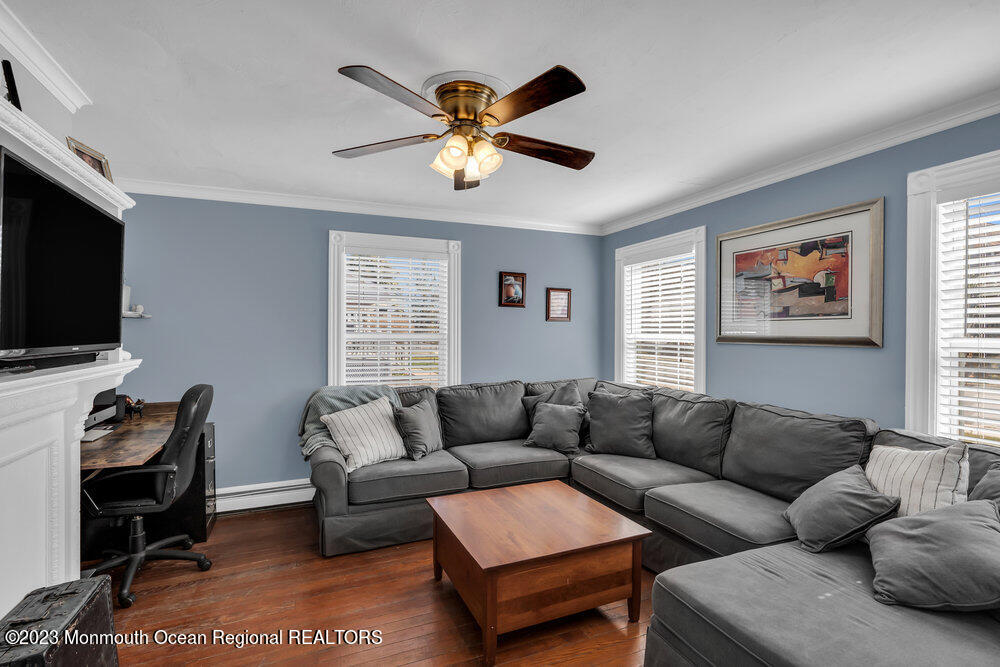 800 Wall Road Spring Lake Heights, NJ 07762 - Photo 17 of 41 a living room with furniture and a flat screen tv