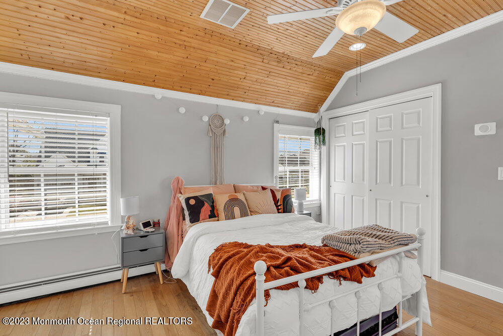 800 Wall Road Spring Lake Heights, NJ 07762 - Photo 24 of 41 a bedroom with a bed and a window