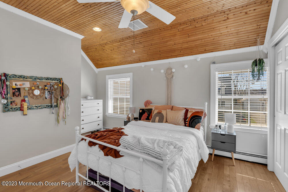 800 Wall Road Spring Lake Heights, NJ 07762 - Photo 27 of 41 a bed room with a bed and a window