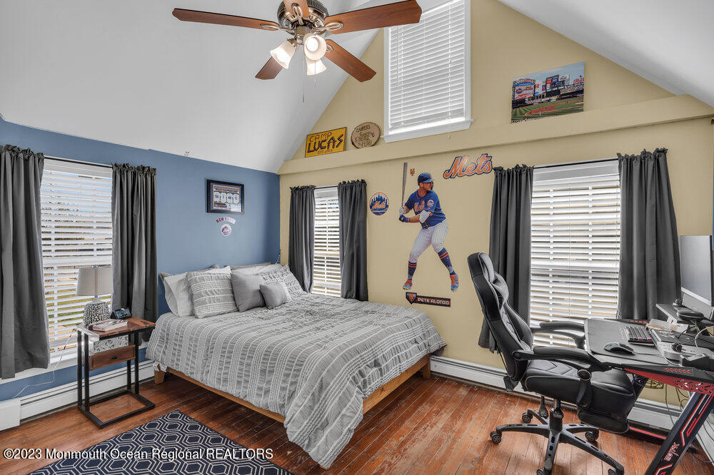 800 Wall Road Spring Lake Heights, NJ 07762 - Photo 29 of 41 a bedroom with a bed and a window