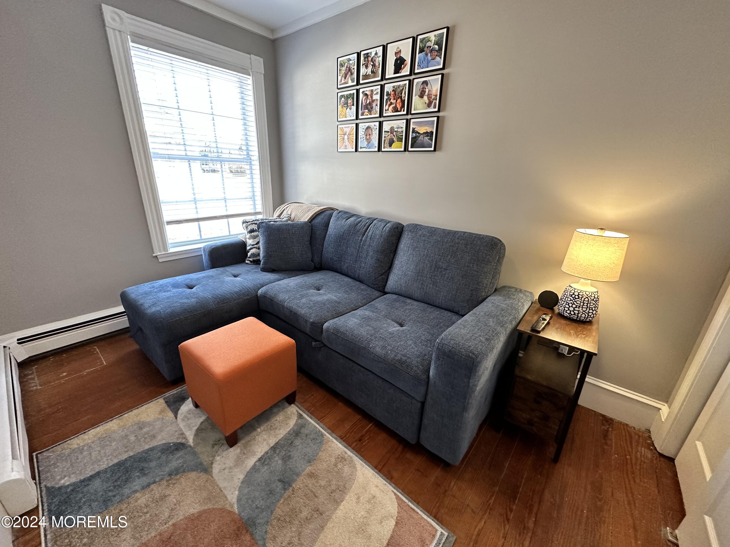 800 Wall Road Spring Lake Heights, NJ 07762 - Photo 31 of 41 a living room with furniture and a window