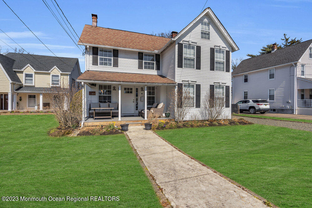800 Wall Road Spring Lake Heights, NJ 07762 - Photo 40 of 41 a front view of a house with a yard and porch