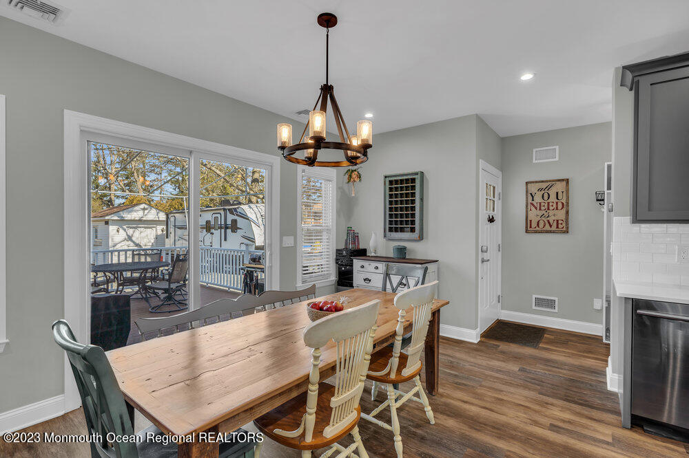 800 Wall Road Spring Lake Heights, NJ 07762 - Photo 9 of 41 a view of a dining room with furniture window and wooden floor