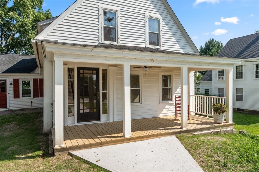 337 Boston Road Sutton, MA 01590 - Photo 4 of 38 front view of a house with a porch