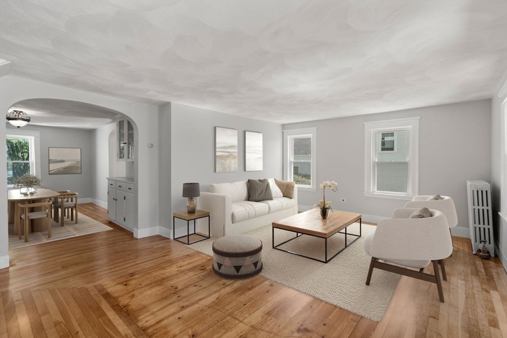 337 Boston Road Sutton, MA 01590 - Photo 7 of 38 a living room with furniture and a table