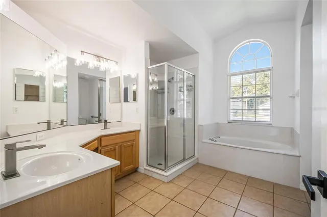 a bathroom with a bathtub and a toilet