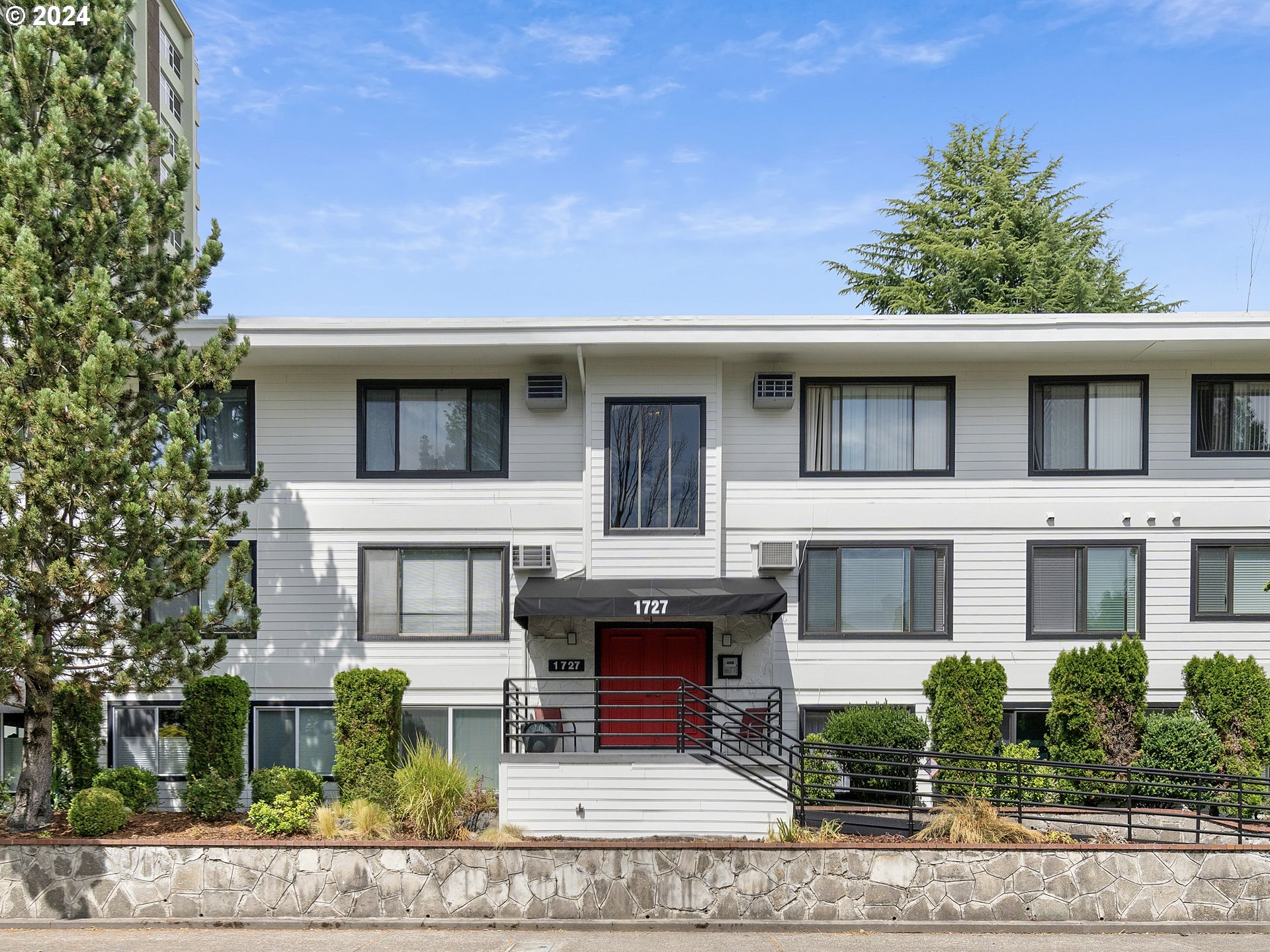 1727 Northeast Multnomah Street, Unit 14 Portland, OR 97232 - Photo 1 of 31 a front view of a house with garden