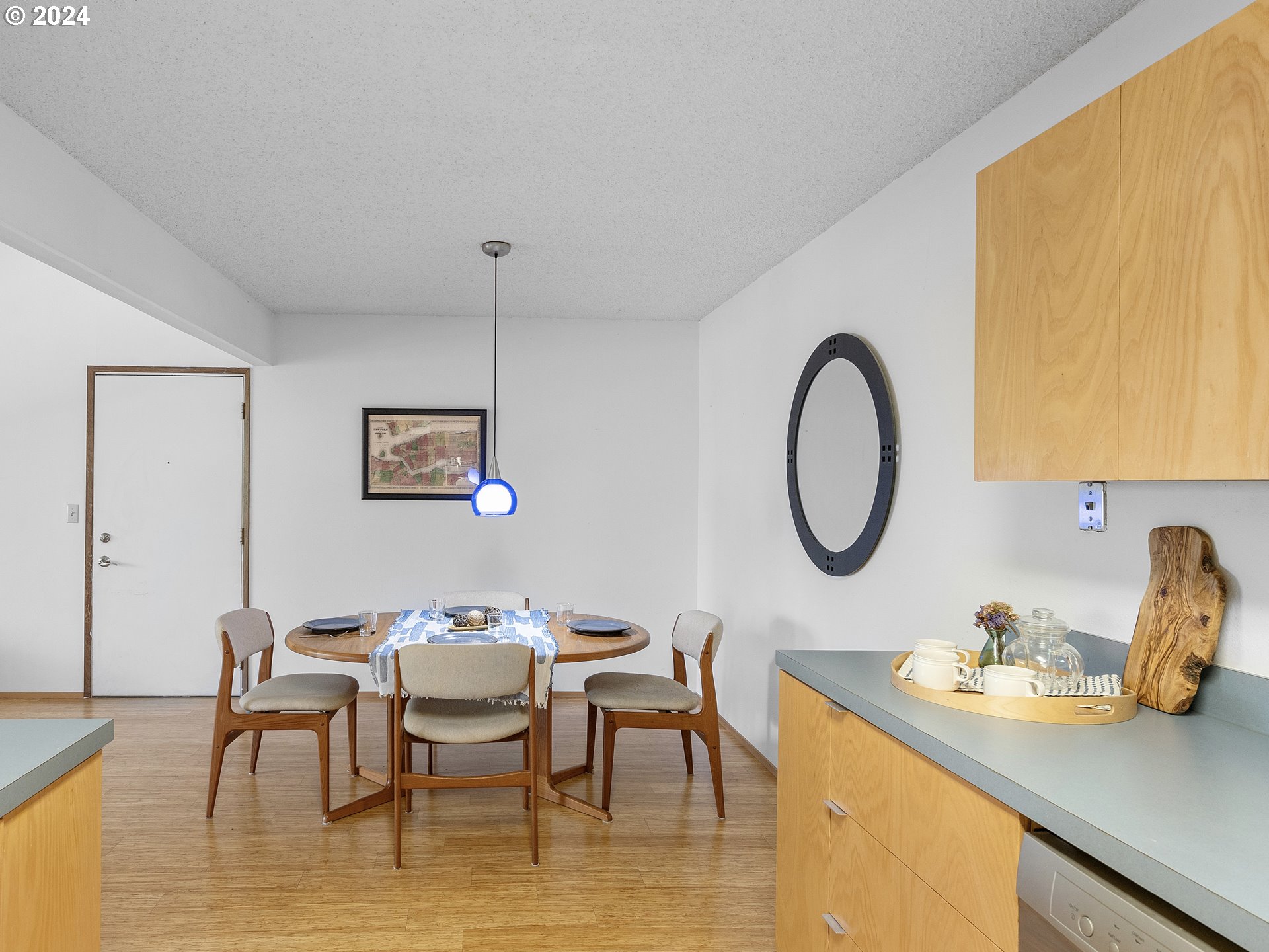1727 Northeast Multnomah Street, Unit 14 Portland, OR 97232 - Photo 12 of 31 a view of a dining room with furniture and a table