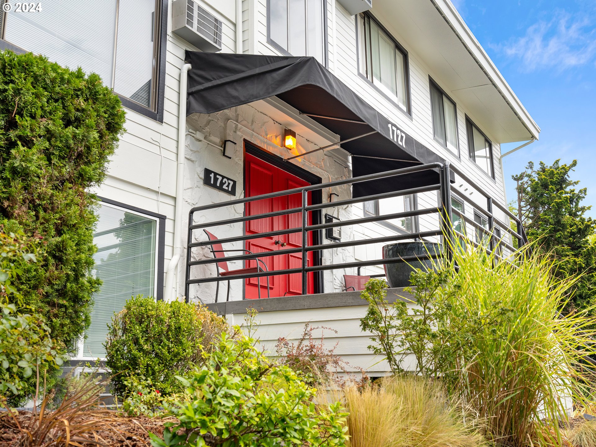 1727 Northeast Multnomah Street, Unit 14 Portland, OR 97232 - Photo 2 of 31 a view of a large building on the street