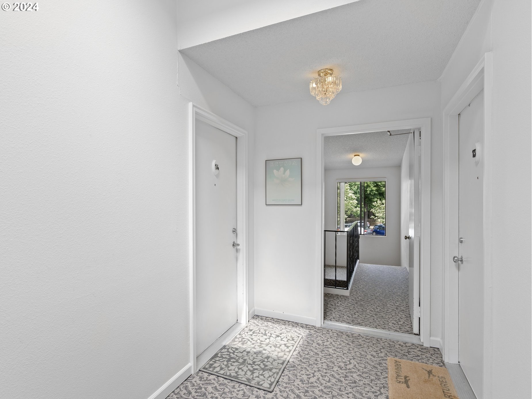 1727 Northeast Multnomah Street, Unit 14 Portland, OR 97232 - Photo 3 of 31 a view of a hallway with interior of the background