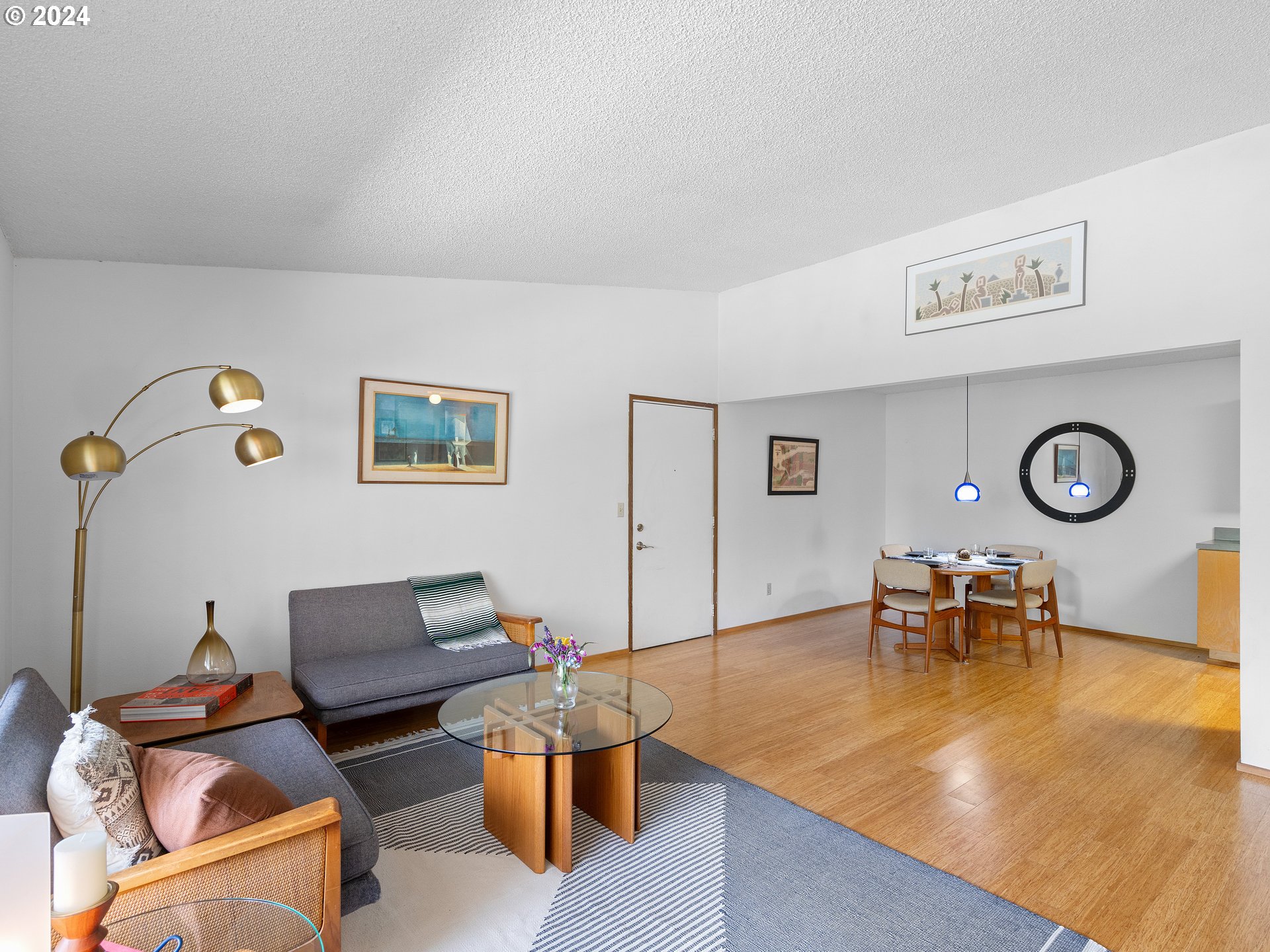 1727 Northeast Multnomah Street, Unit 14 Portland, OR 97232 - Photo 7 of 31 a living room with furniture and a table
