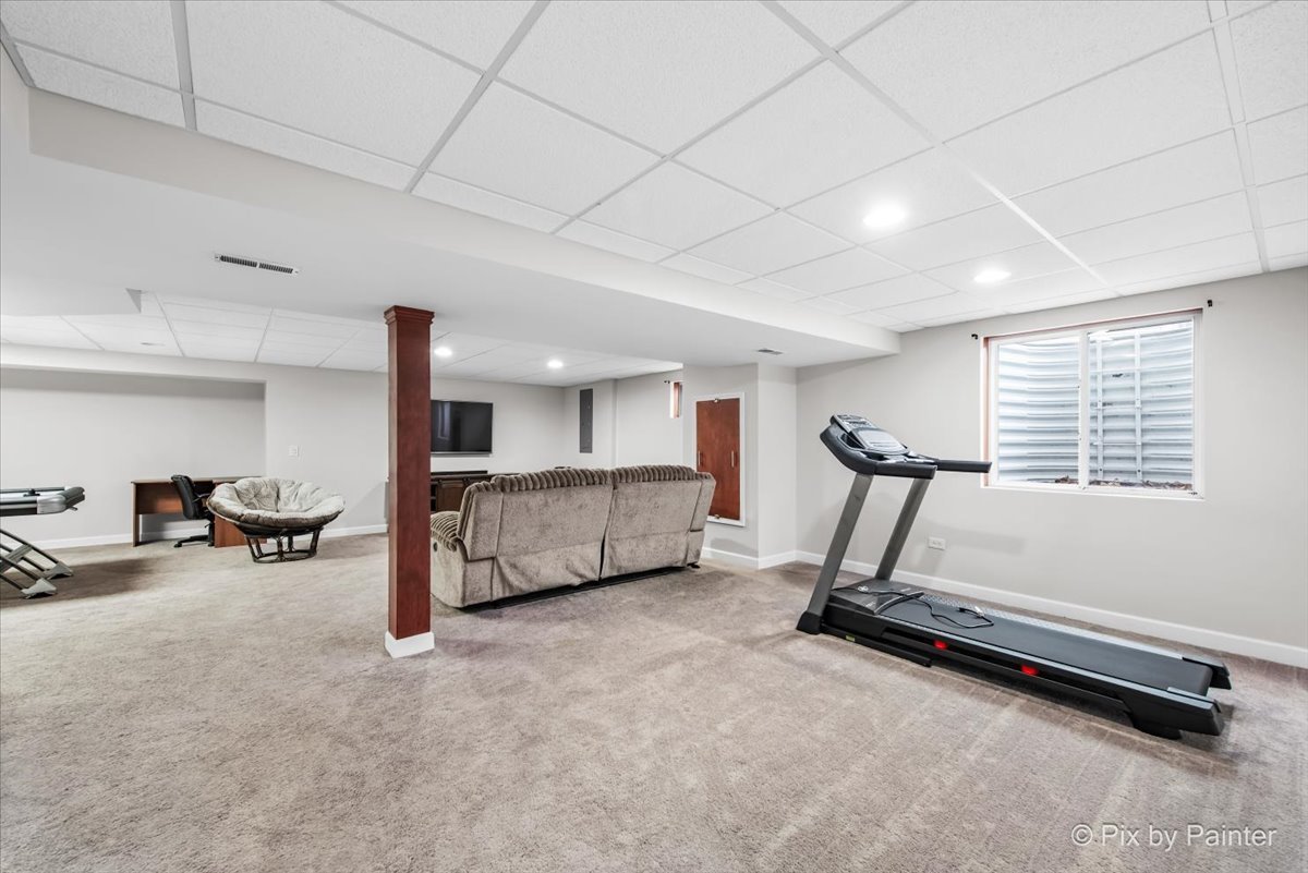 26428 Rustling Birch Way Plainfield, IL 60585 - Photo 27 of 49 a view of a room with gym equipment