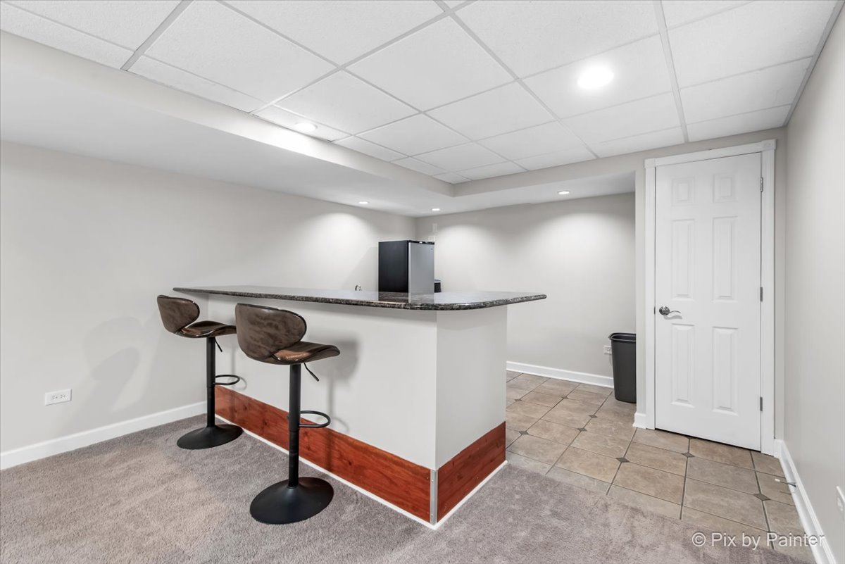 26428 Rustling Birch Way Plainfield, IL 60585 - Photo 29 of 49 a living room with furniture