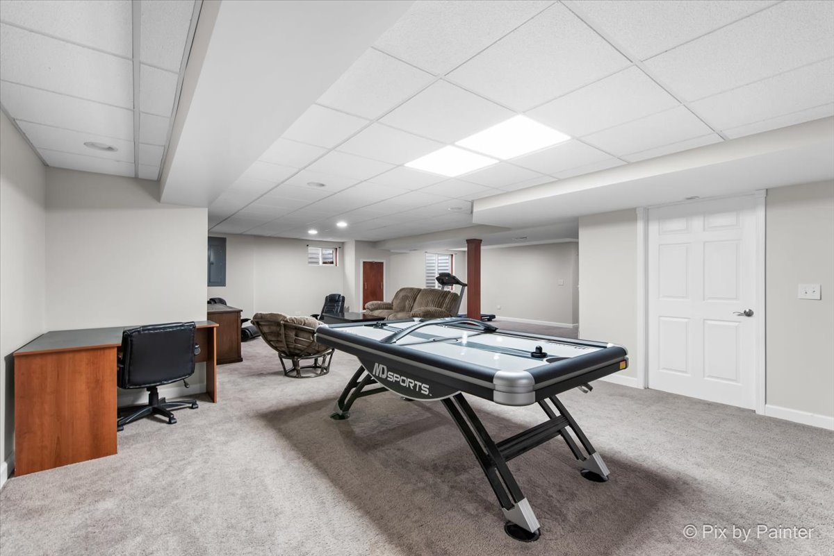 26428 Rustling Birch Way Plainfield, IL 60585 - Photo 34 of 49 a view of a room with gym equipment