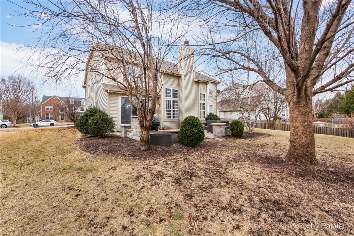26428 Rustling Birch Way Plainfield, IL 60585 - Photo 36 of 49 a view of a yard with a tree