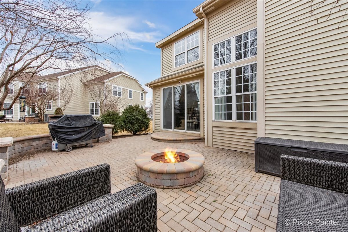 26428 Rustling Birch Way Plainfield, IL 60585 - Photo 38 of 49 a view of a patio on the deck and a backyard