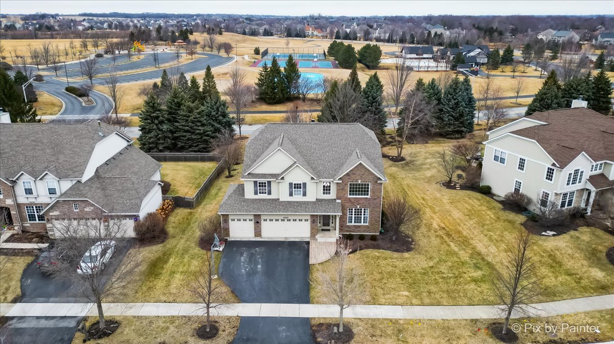 26428 Rustling Birch Way Plainfield, IL 60585 - Photo 40 of 49 an aerial view of a house with a lake view