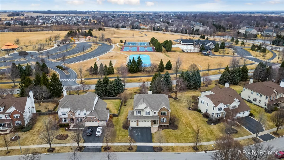26428 Rustling Birch Way Plainfield, IL 60585 - Photo 41 of 49 an aerial view of residential houses with outdoor space