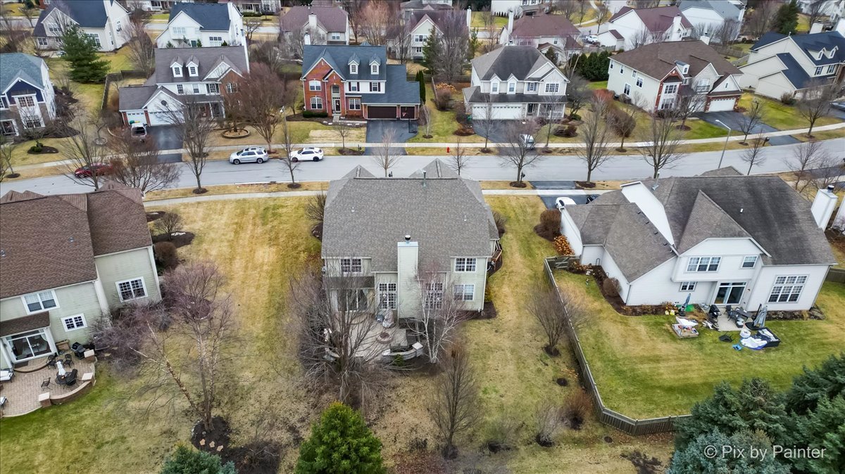 26428 Rustling Birch Way Plainfield, IL 60585 - Photo 42 of 49 an aerial view of residential houses with outdoor space and parking