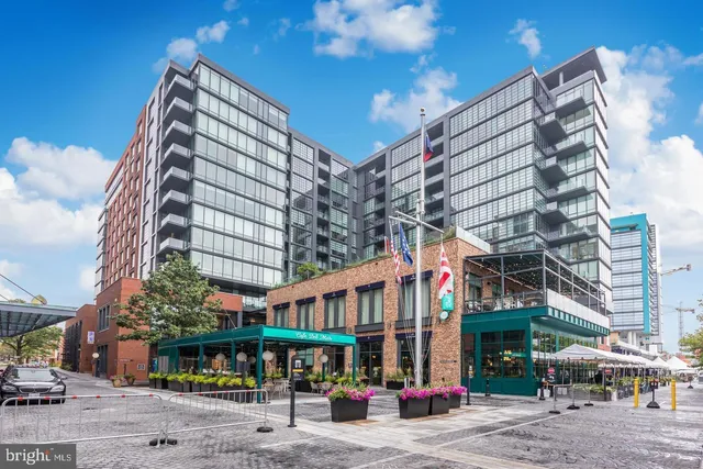 a view of a building with a street