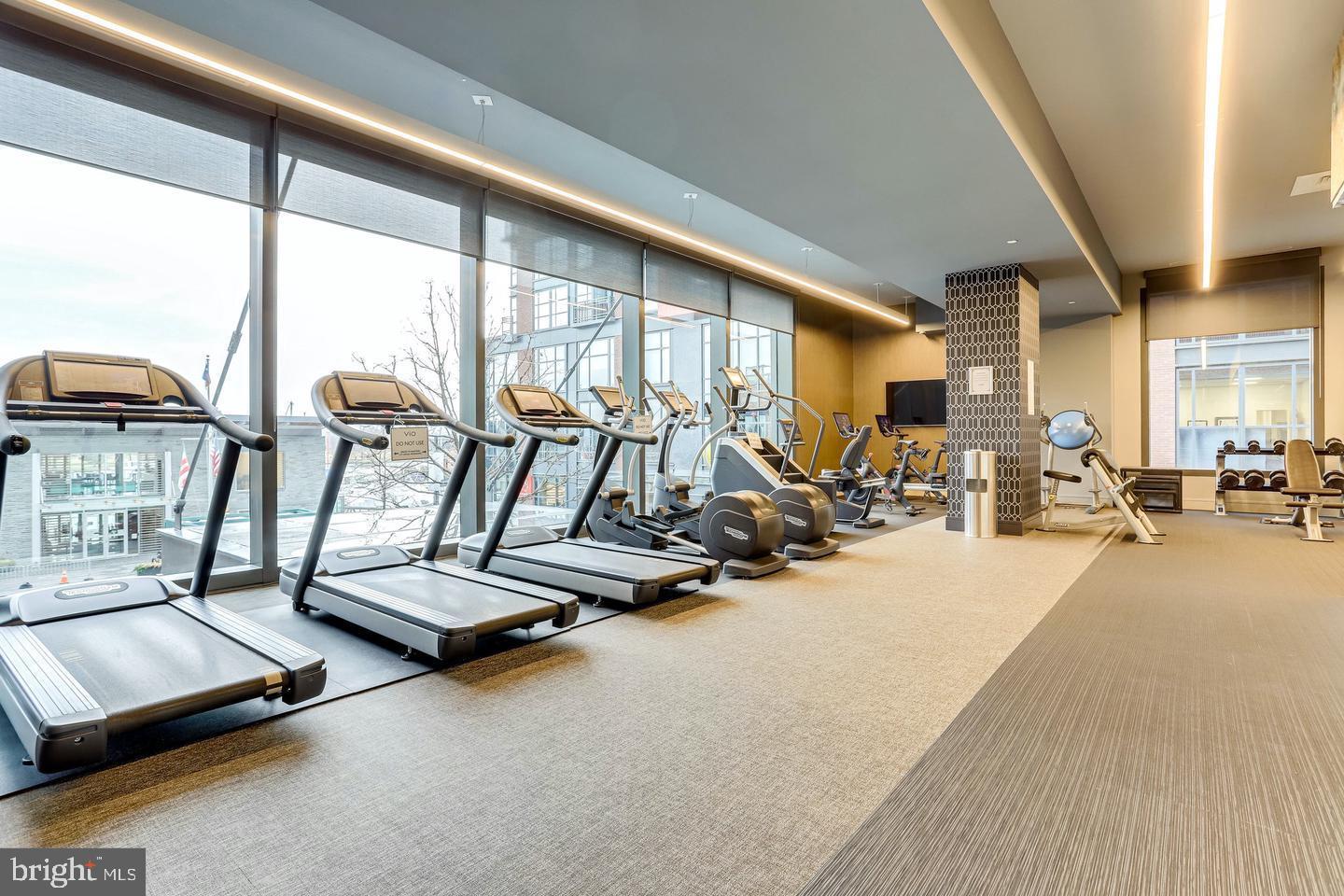 45 Sutton Square Southwest, Unit 607 Washington, DC 20024 - Photo 19 of 28 a view of a room with gym equipment