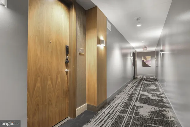 a bathroom with a glass door shower