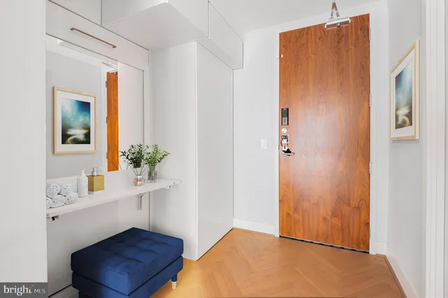 a view of kitchen with furniture and wooden floor