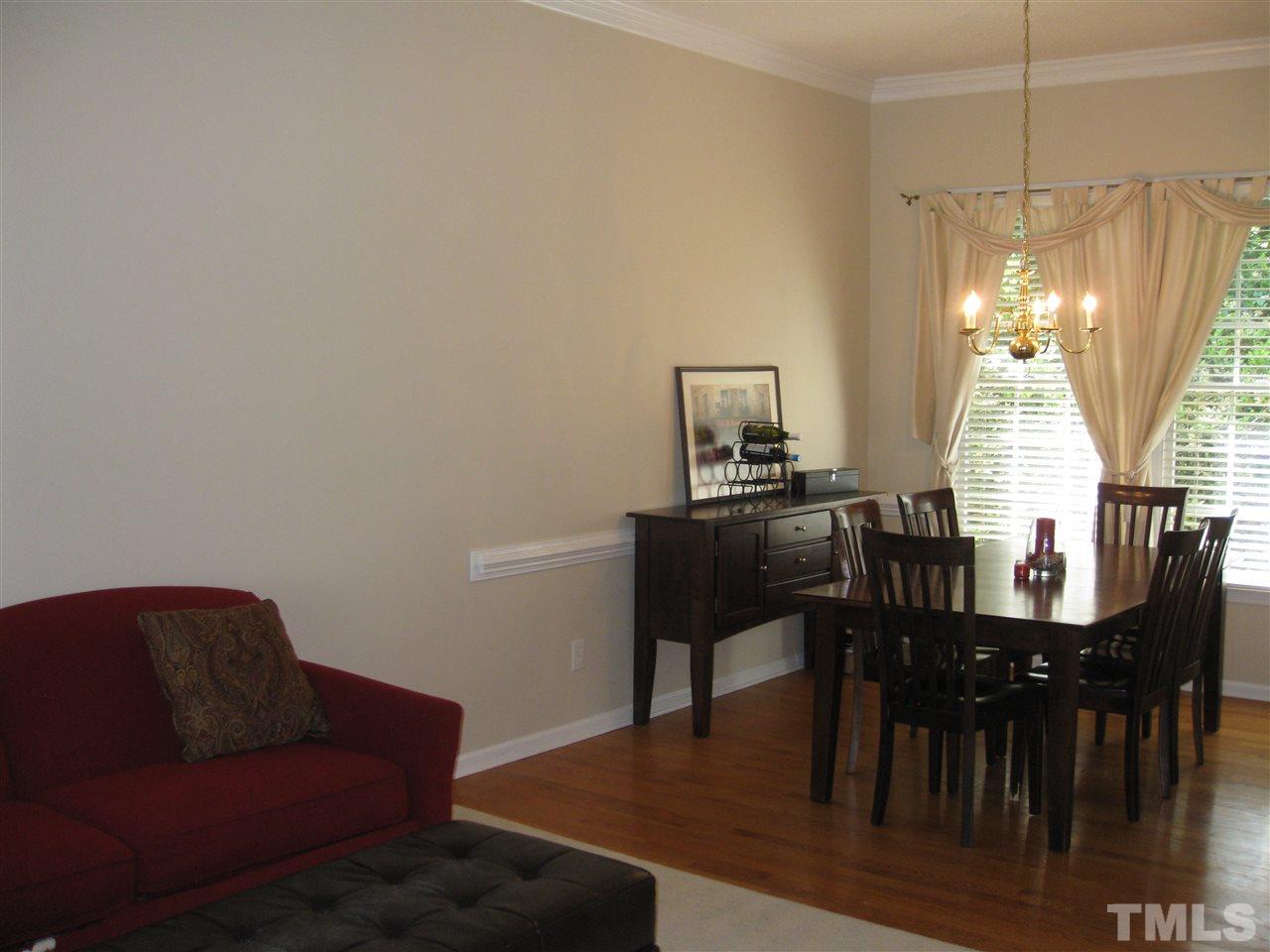 3313 Stone Castle Court Raleigh, NC 27613 - Photo 2 of 15 a view of a livingroom with furniture and window