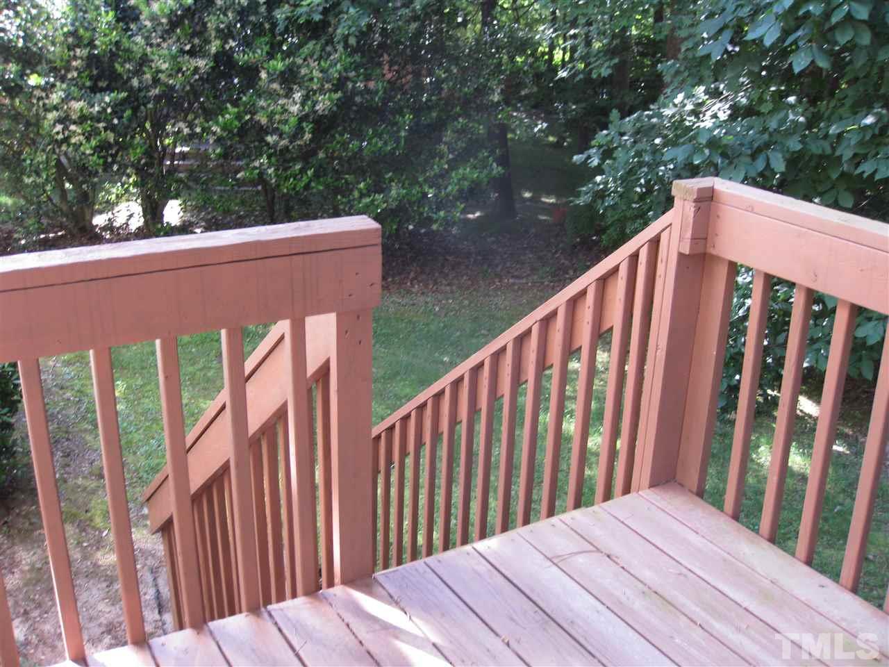 3313 Stone Castle Court Raleigh, NC 27613 - Photo 14 of 15 a balcony with wooden floor in outdoor space