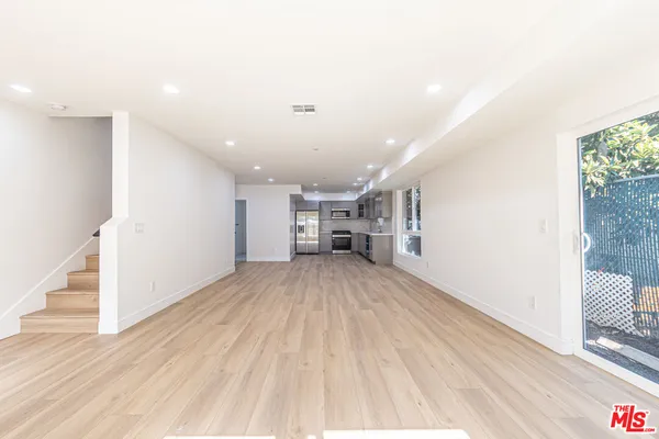 a view of livingroom with furniture and wooden floor